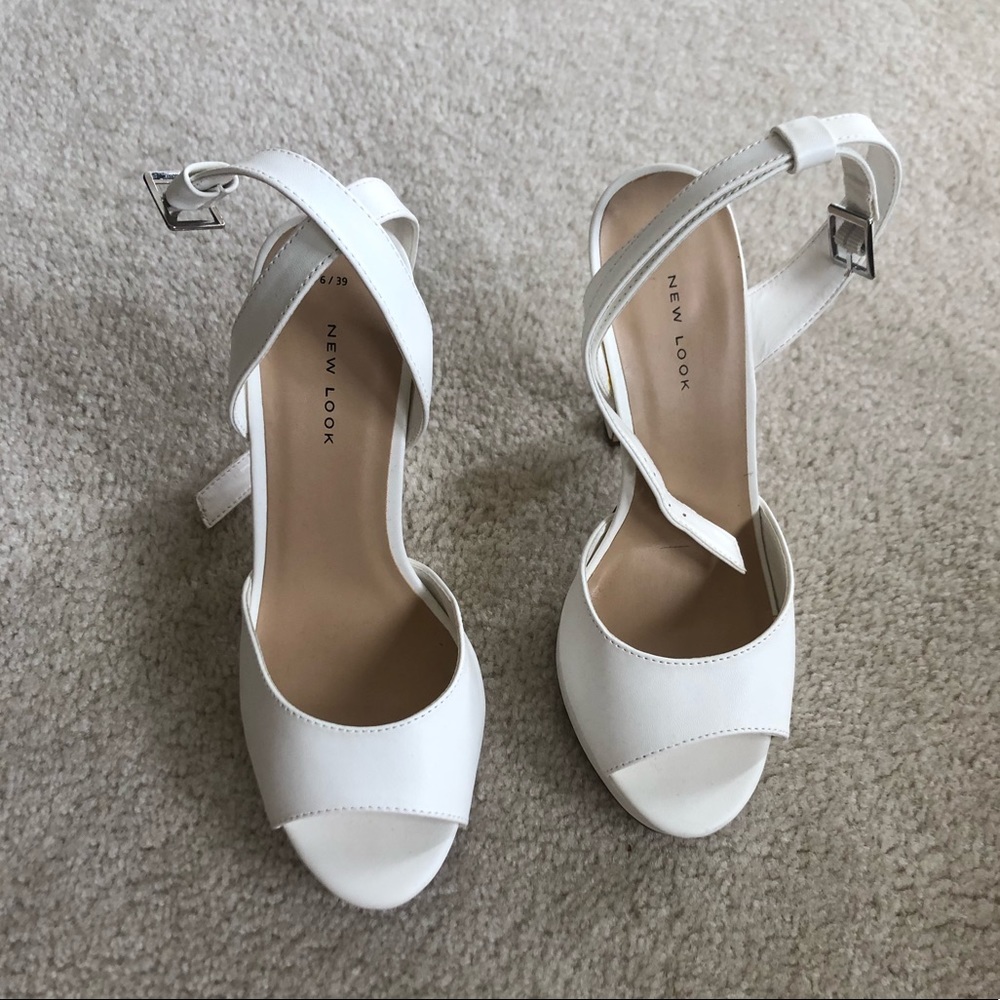 Never worn White platform heels/pumps